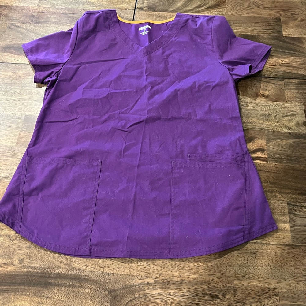 Scrubstar scrub shirt. Size is M.